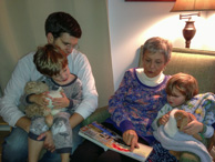 November 2012.  Reading a bedtime story to James, Ian, and Andrew.