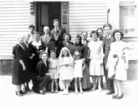 The young boy at lower left center is Jerry Jutras.  We believe the the nun behind him is Sister Lillian Jutras.  Jan's parents Gerard and Celina are at the right of the photo.The couple to Gerard's right are Dave and Gertrude (Aunt Gert) Taylor.  Jan's Mom Celina appears to be pregnant; if so that would be Jan!